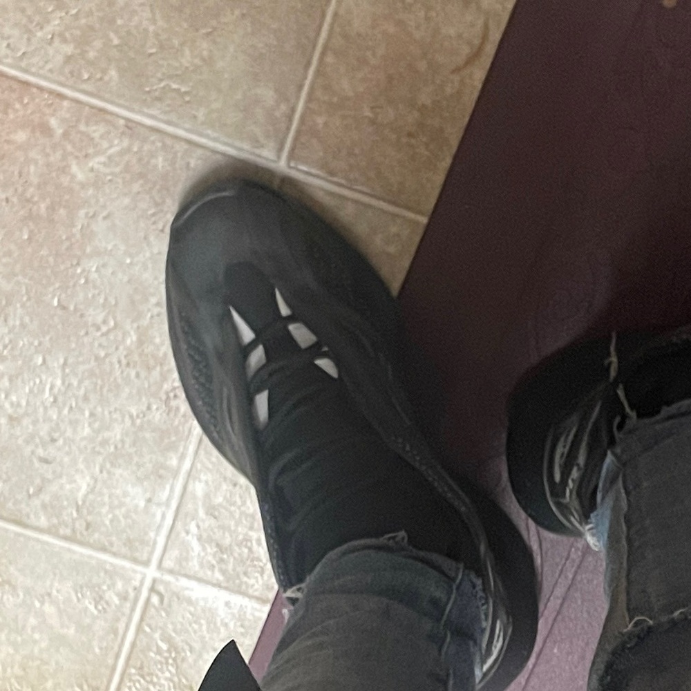 Yeezy Black Sneakers with a dark glow in the dark theme